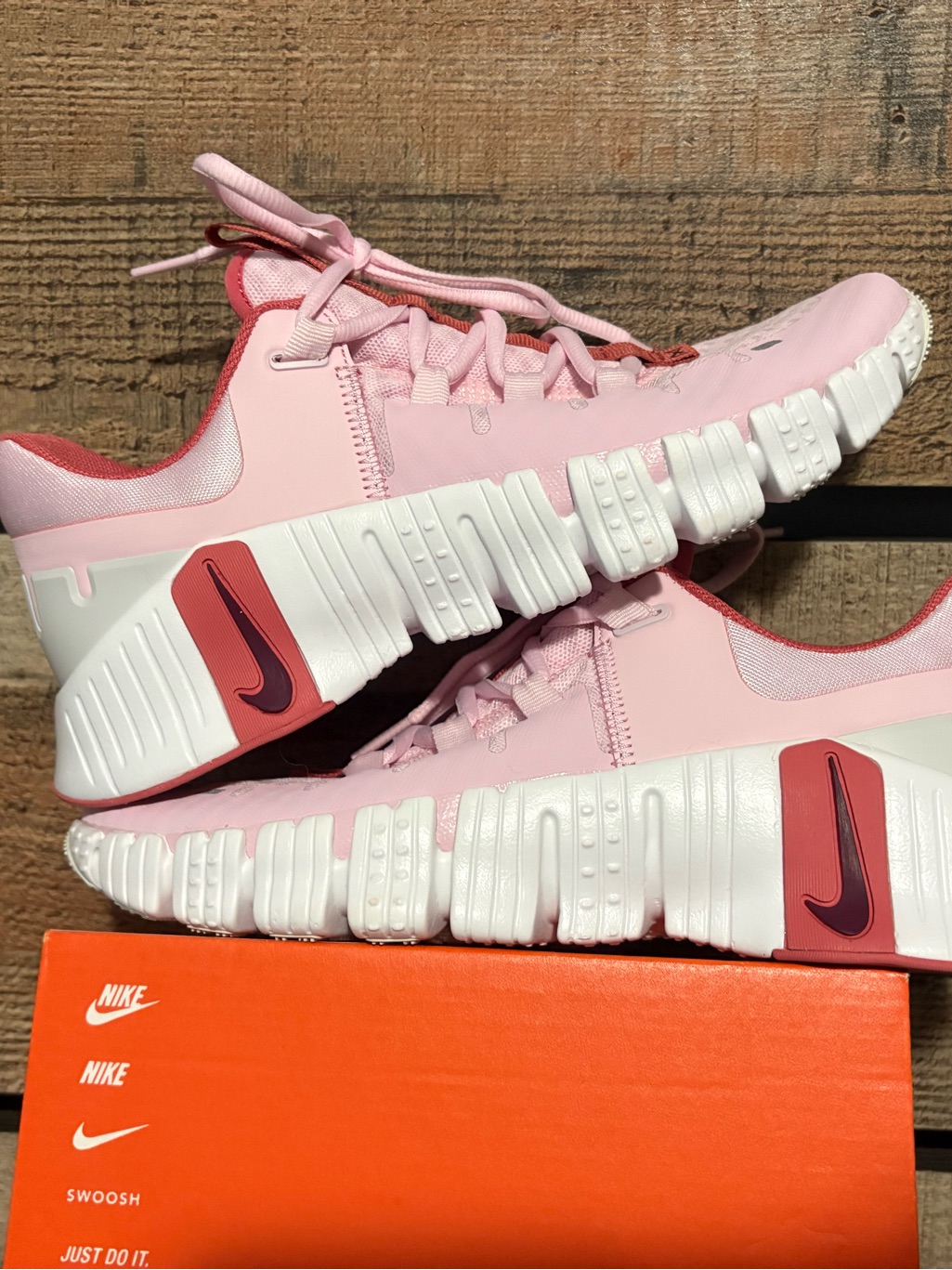 Nike Metcons. Pink And Coral Low-Profile Trainers